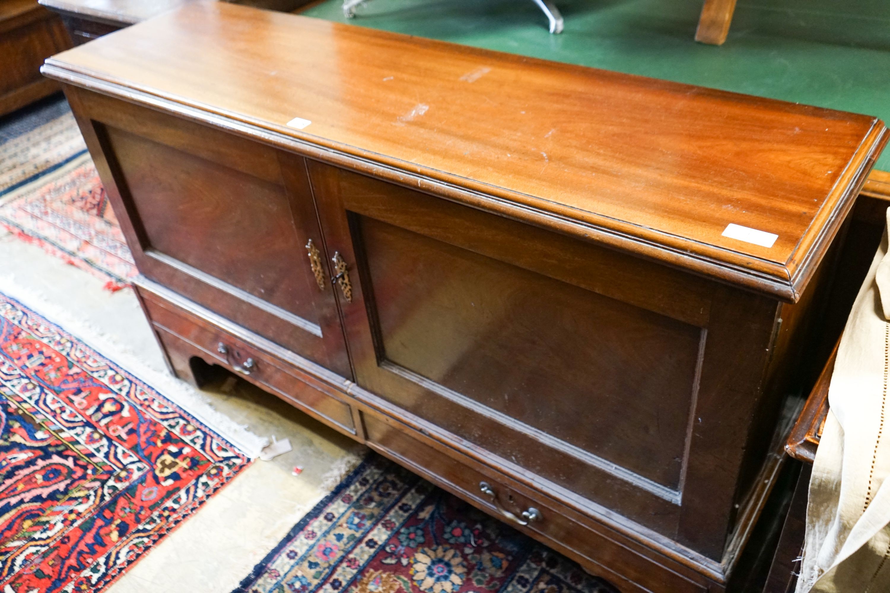 A George III mahogany dwarf cabinet constructed from old timber, width 140cm, depth 39cm, height 85cm